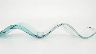 Abstract Glass Wave Ribbon on White Background