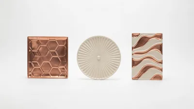 Three Decorative Ceramic Tiles With Metallic Copper Accents