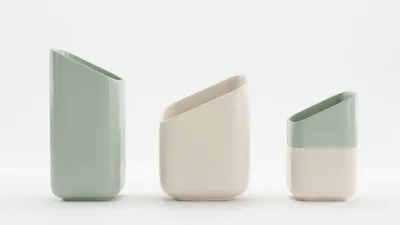 Three Modern Ceramic Vases On White Background