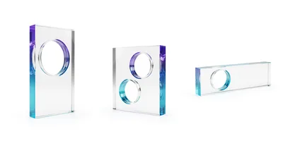 Three Transparent Glass Blocks With Circular Cutouts