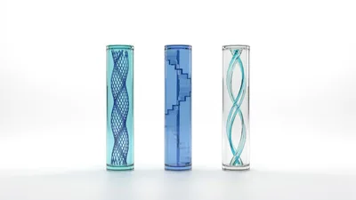 Three Abstract Glass Cylinders With Geometric Internal Structures