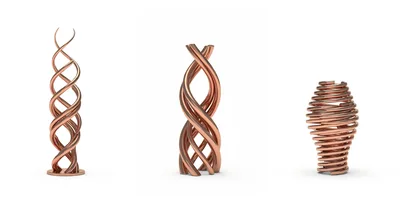 Three Abstract Copper Metal Sculptures On White Background