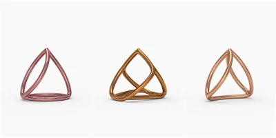Three Metallic Geometric Sculptures On White Background