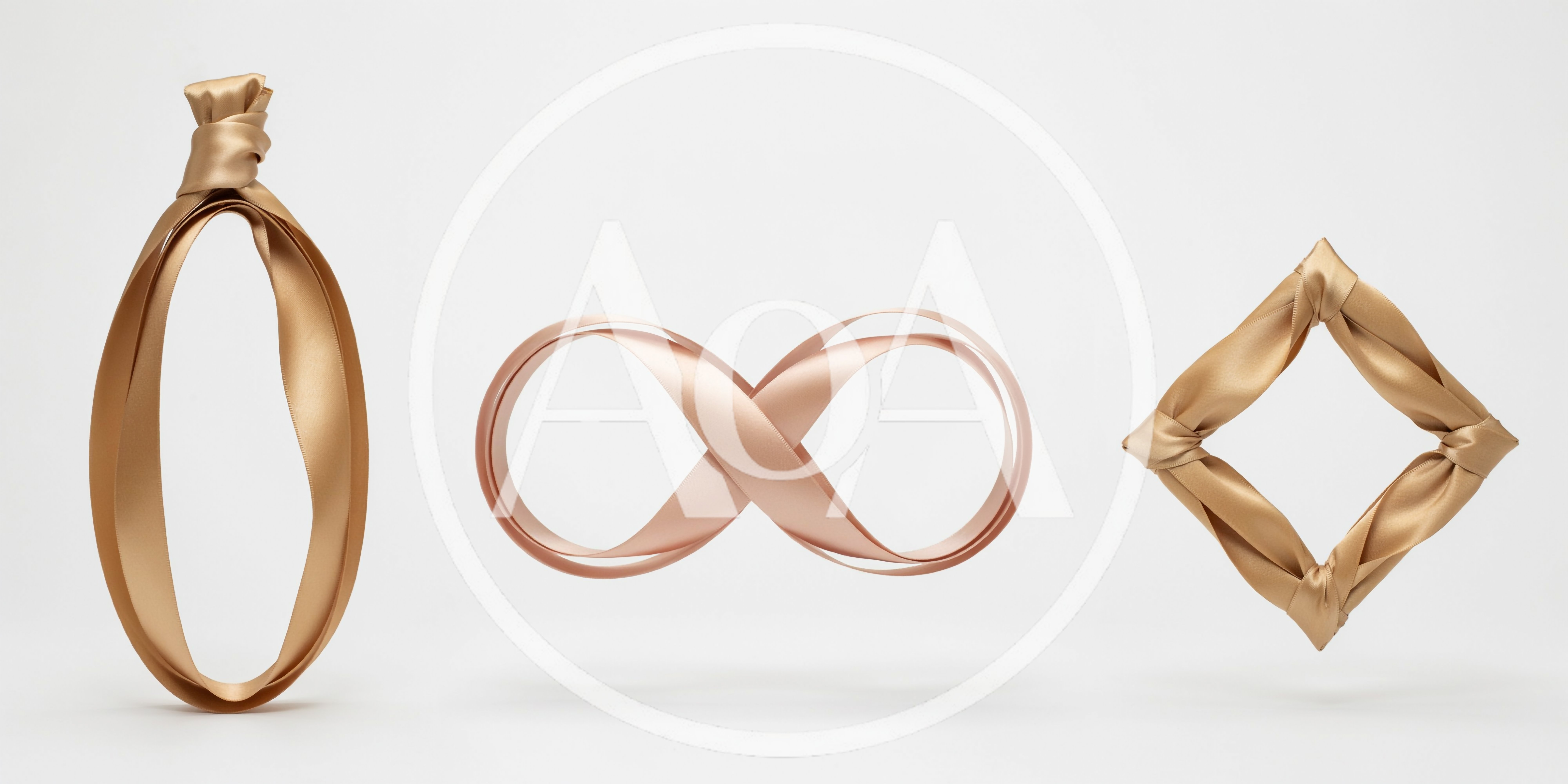 Gold Ribbon Shapes Floating On White Background