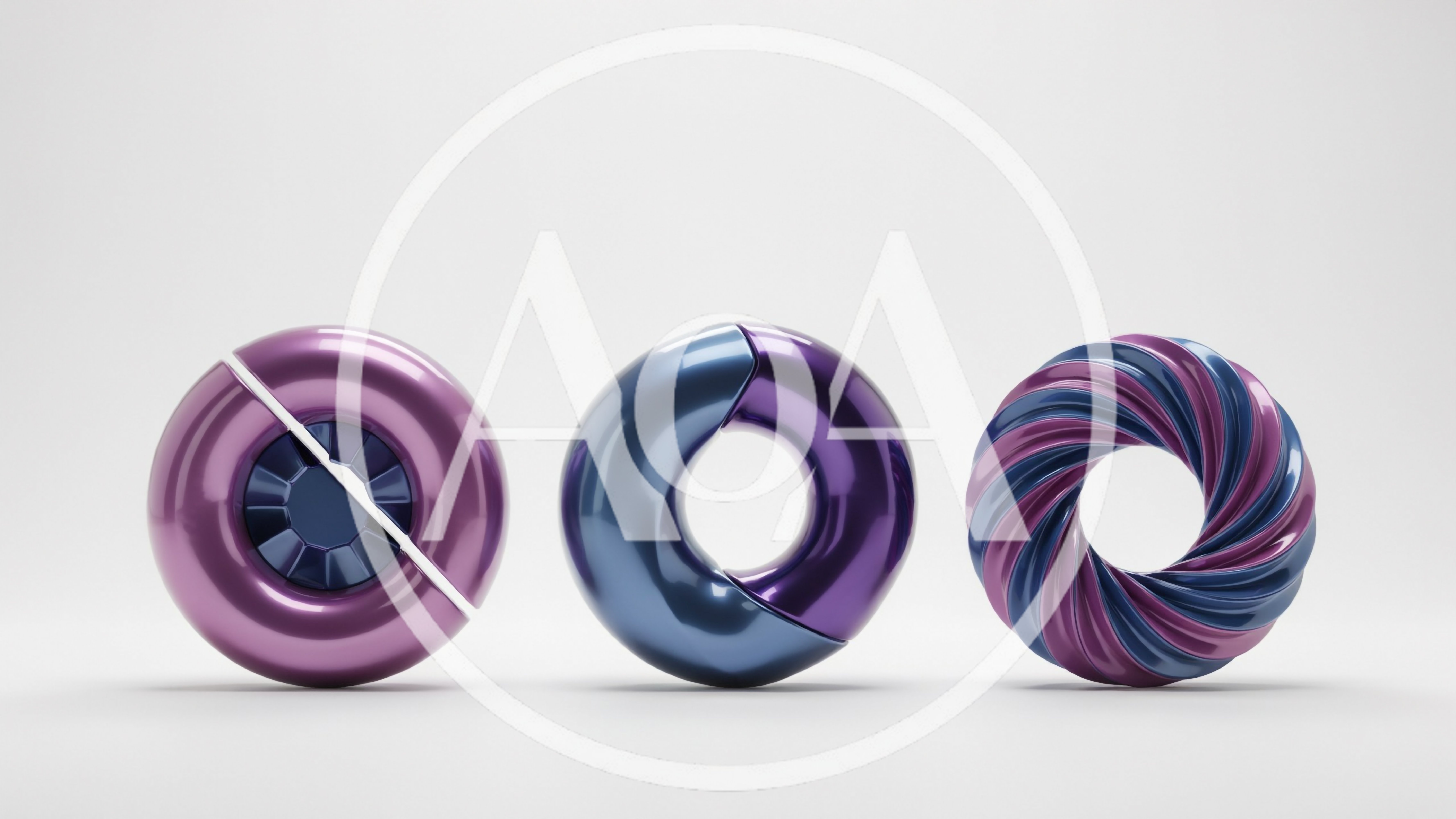 Three Abstract Metallic Torus Shapes On White Background