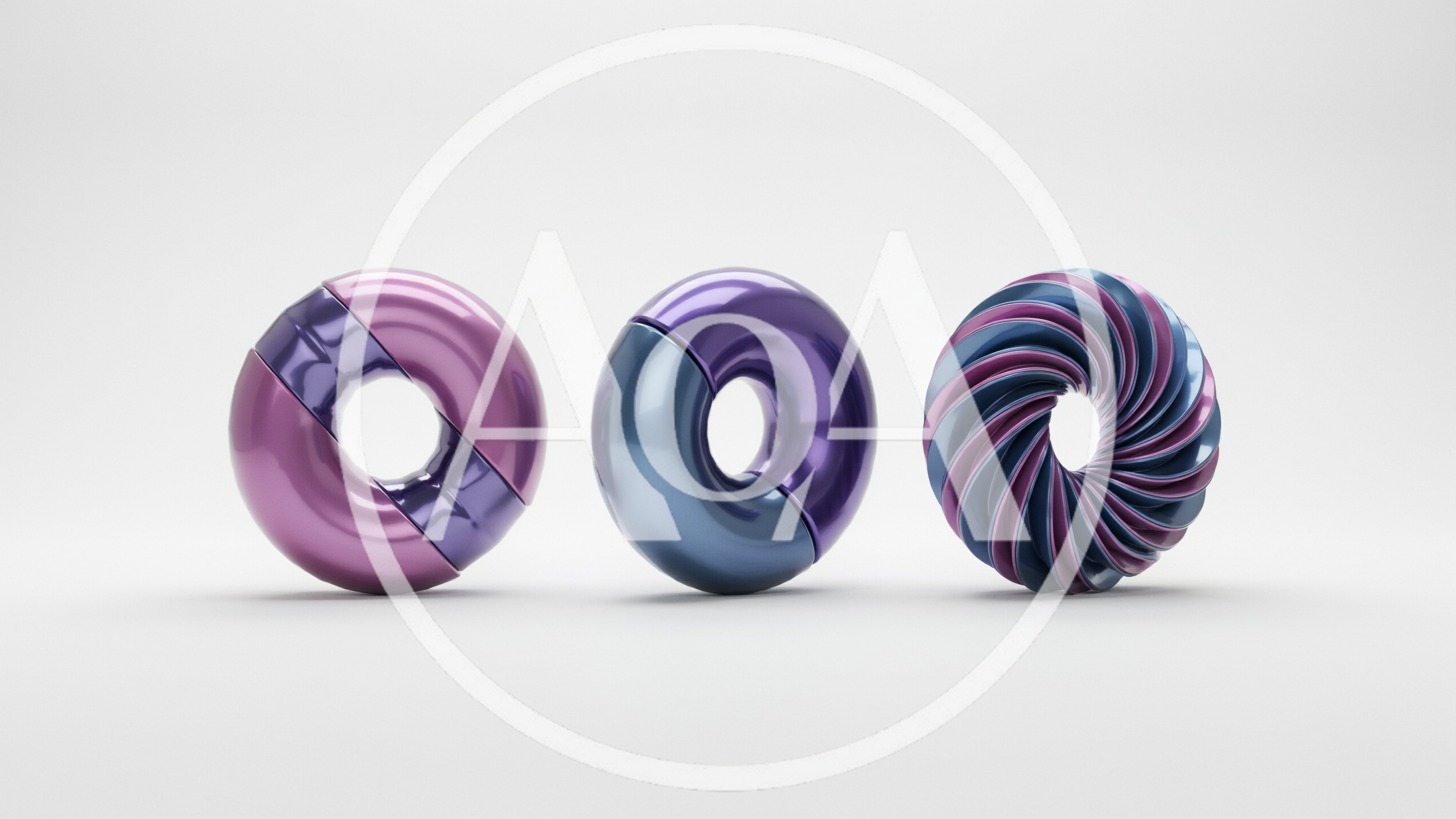 Three Abstract Metallic Torus Shapes On White Background