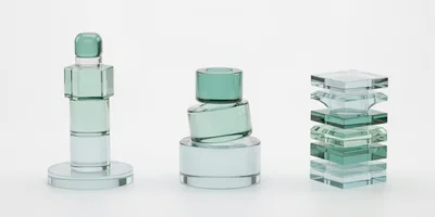 Abstract Glass Geometric Sculptures On White Background
