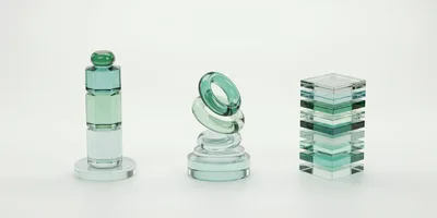 Abstract Glass Geometric Sculptures On White Background