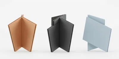 Three Abstract Geometric Sculptures In Different Colors