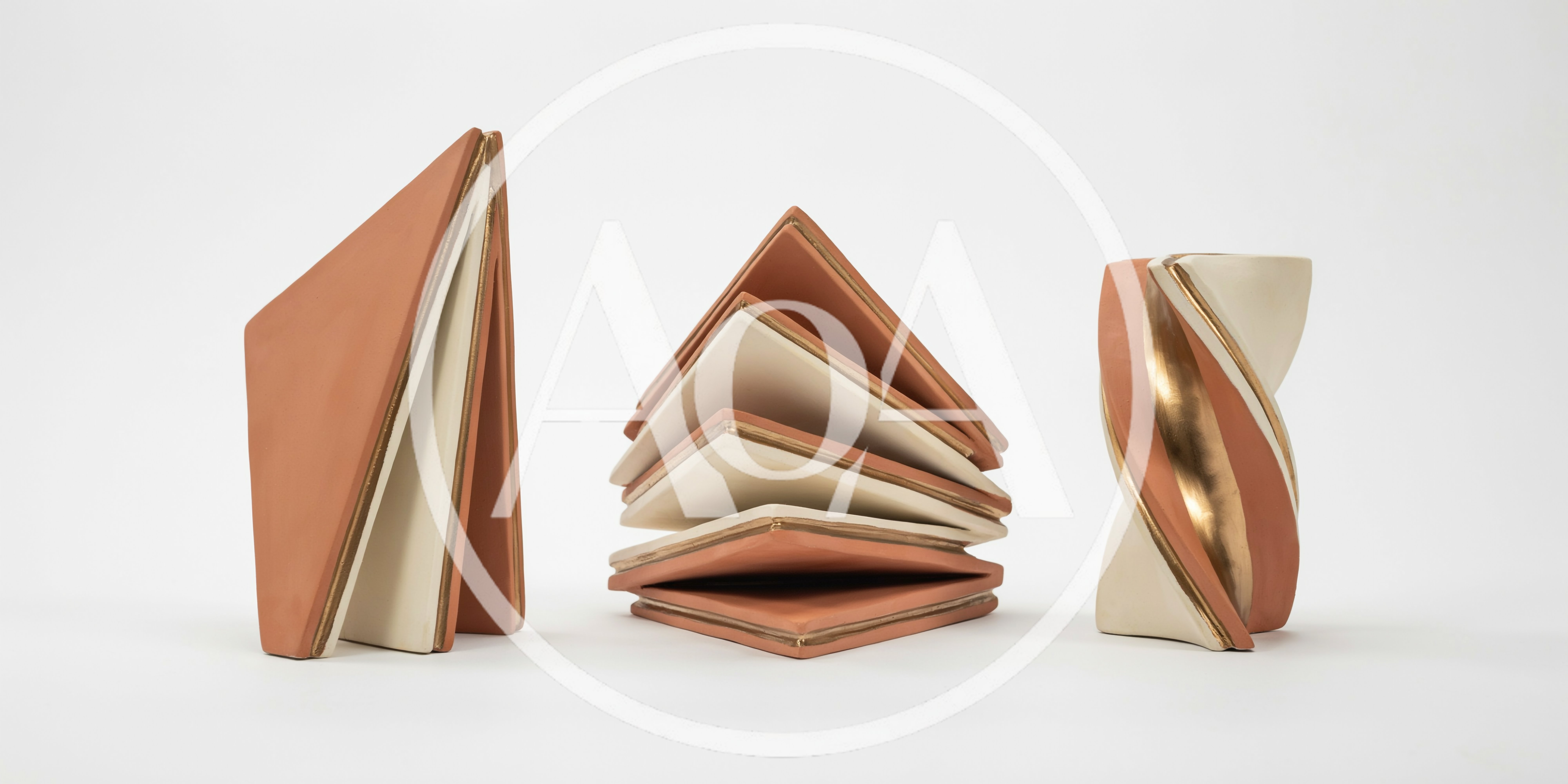 Three Modern Ceramic Sculptures On White Background