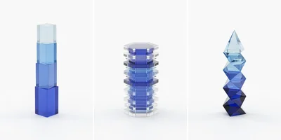 Three Abstract Geometric Glass Sculptures On White Background