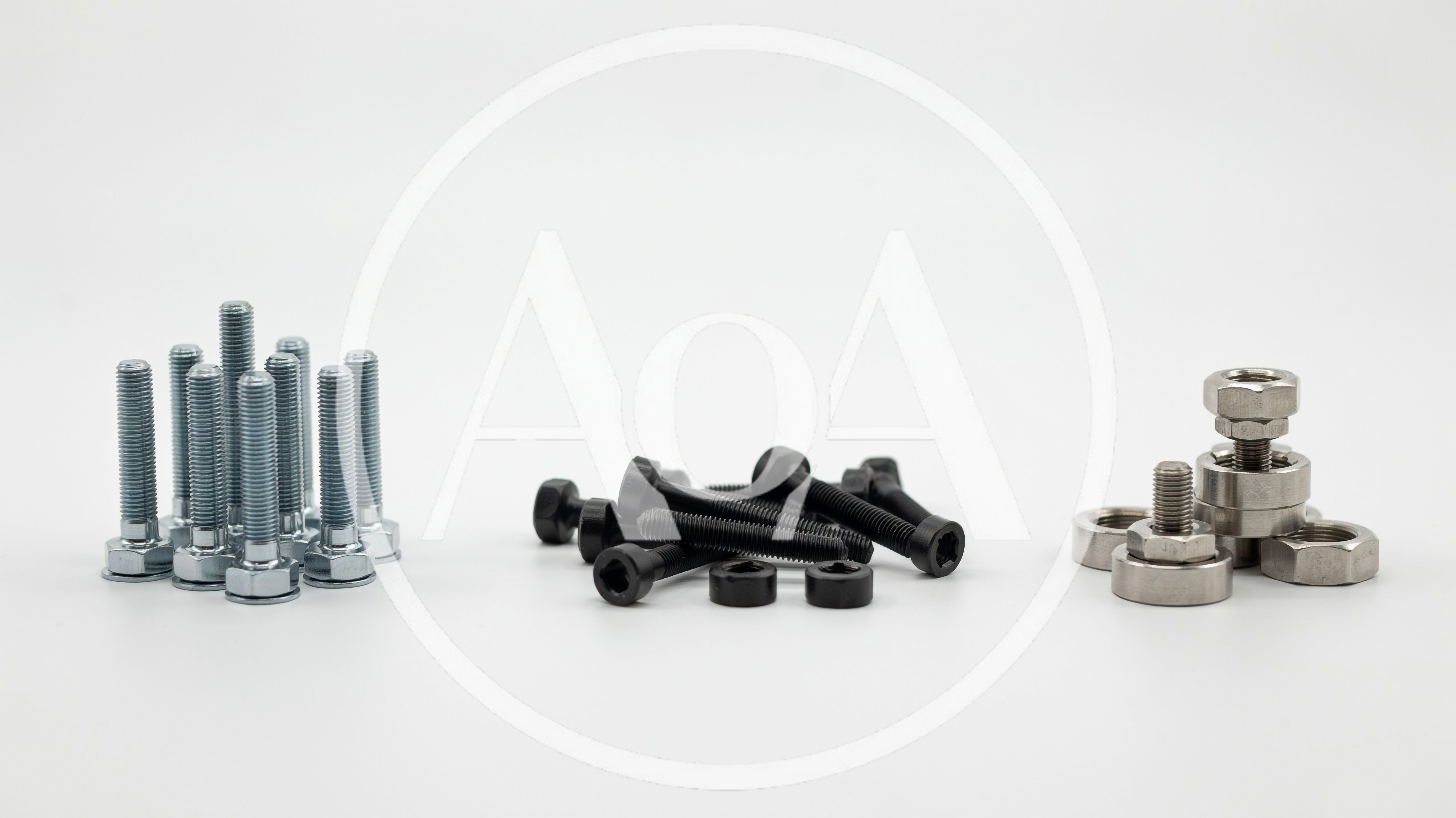 Assorted Metal Bolts and Nuts on White Background