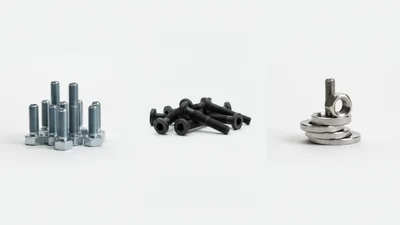 Assorted Metal Bolts And Washers On White Background