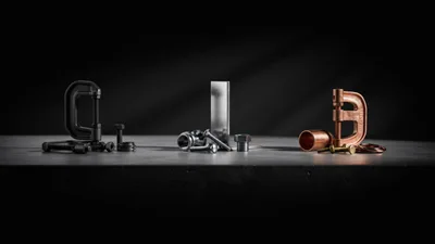 Assorted Industrial Hardware Components on Dark Surface