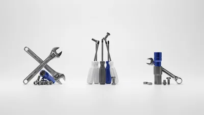 Assorted Hand Tools And Hardware On White Background