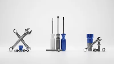 Assorted Hand Tools and Hardware on White Background