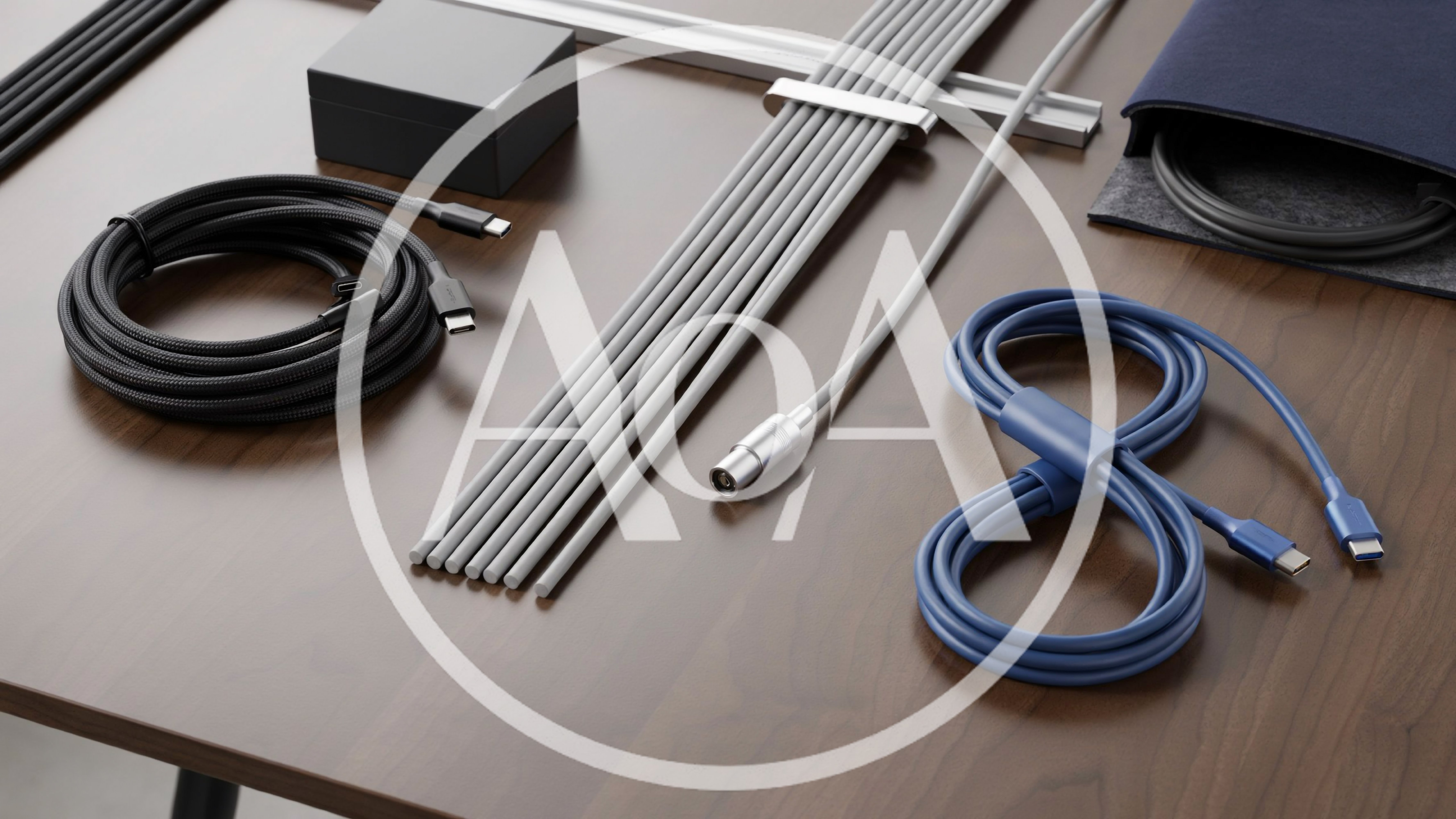 Organized Tech Accessories And Cables On Wooden Desk