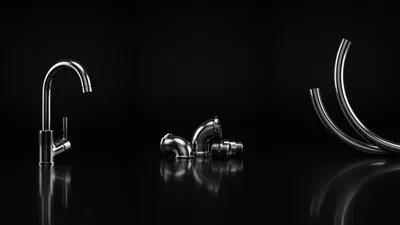 Chrome Plumbing Fixtures and Pipes on Black Background
