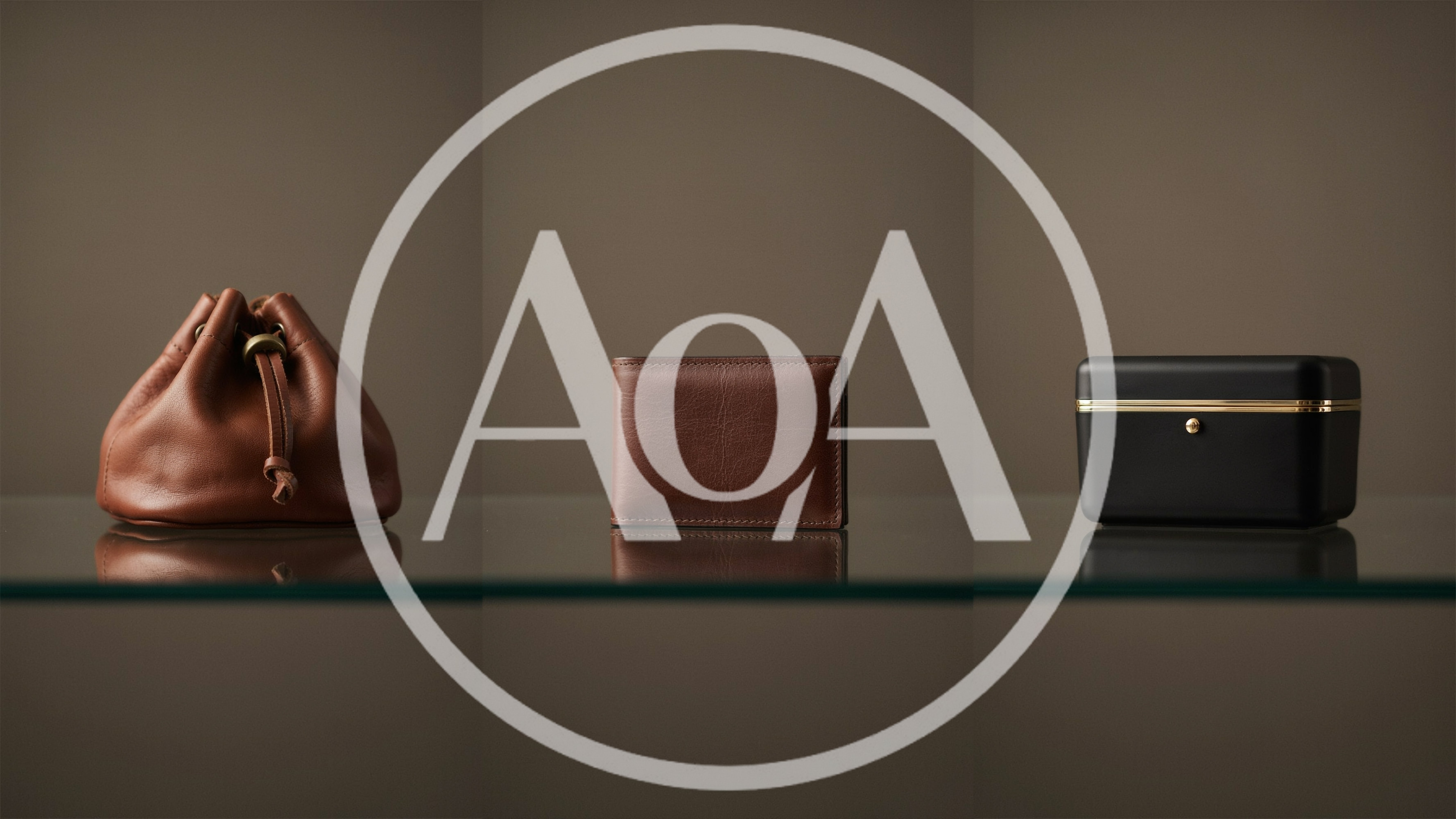 Luxury Leather Goods Displayed on Glass Shelf