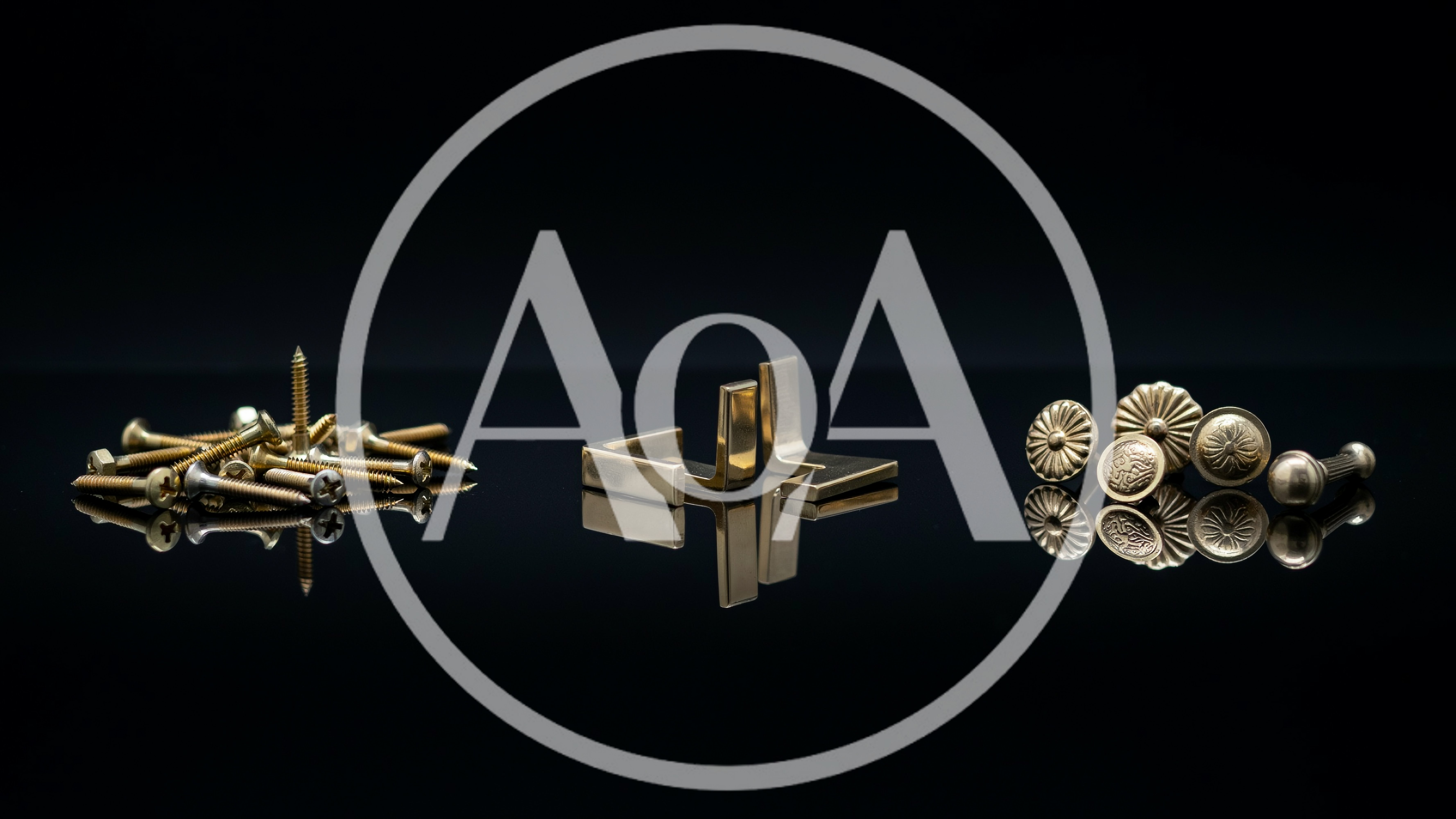 Assorted Brass Hardware Components On Reflective Surface