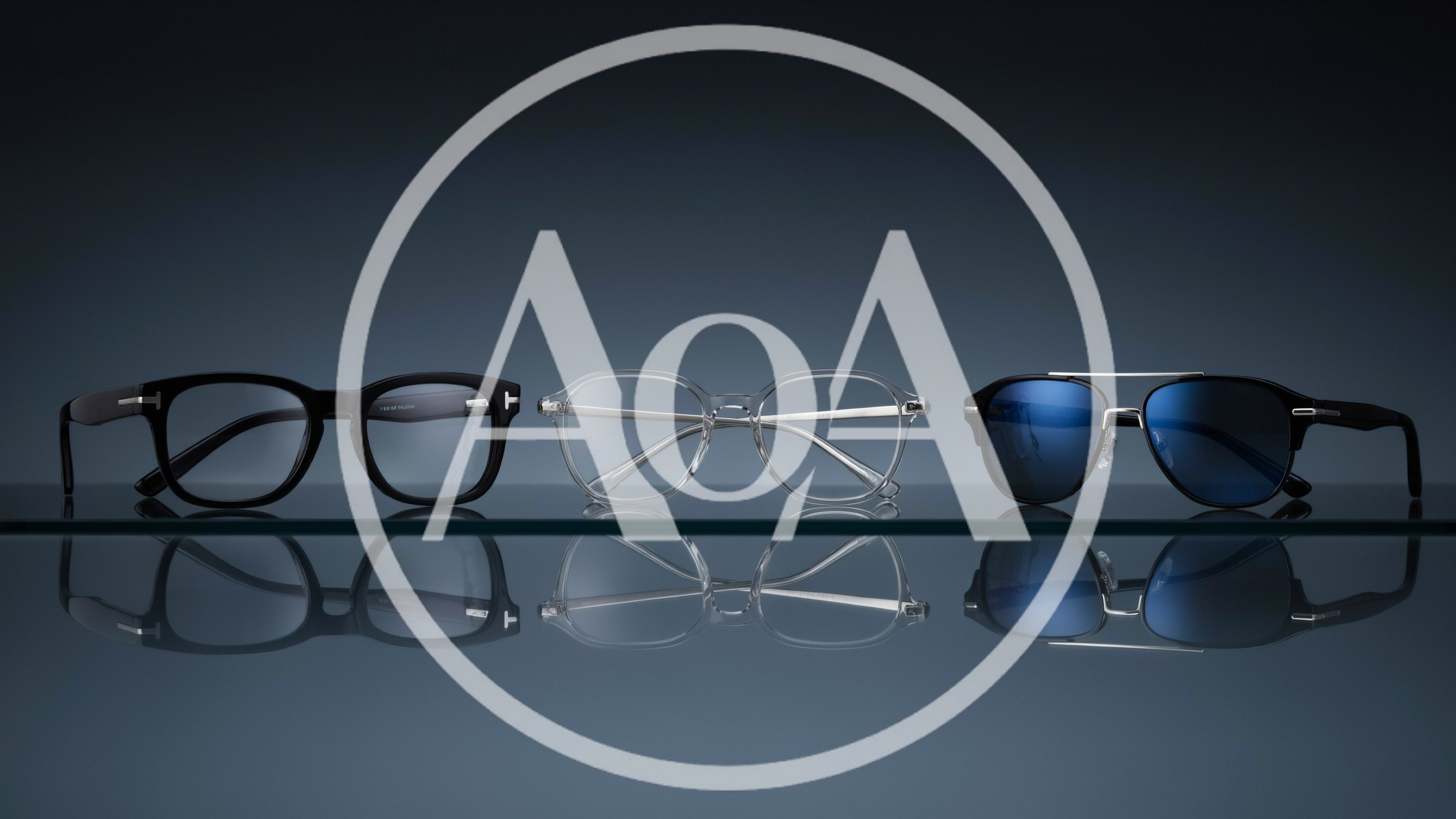 Three Pairs Of Designer Eyewear On Reflective Surface