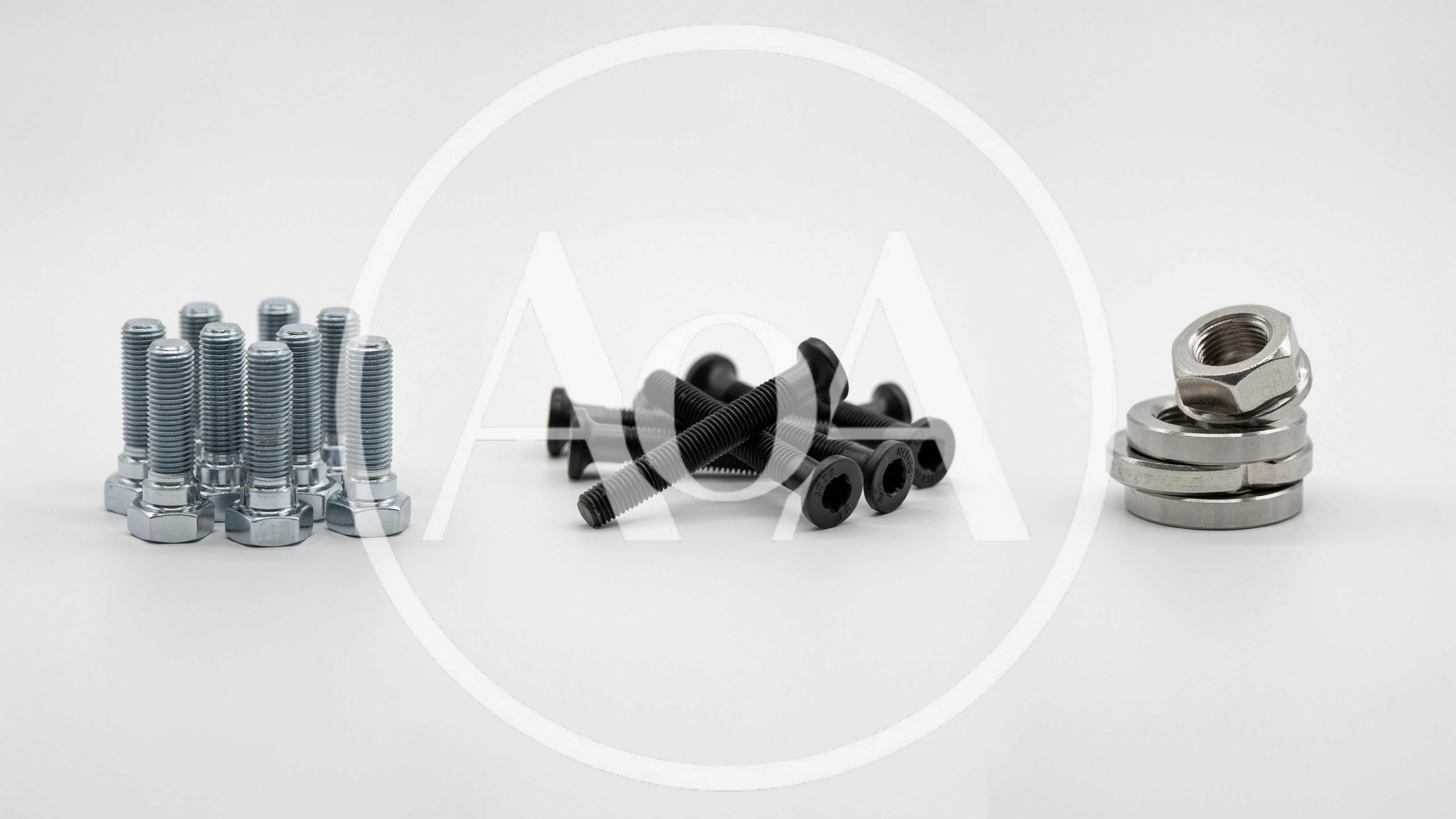 Assorted Metal Bolts and Nuts on White Background