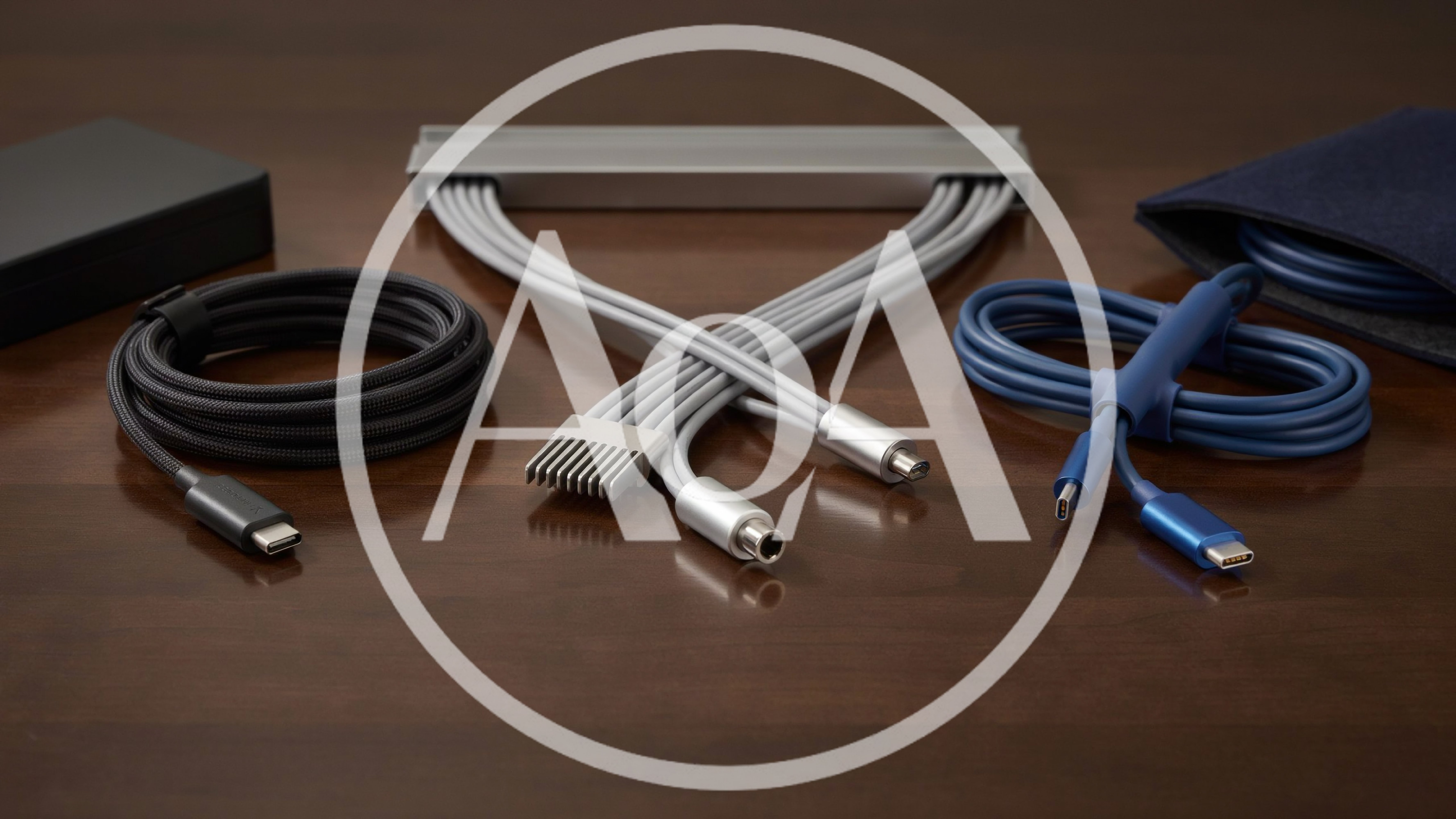Assorted Tech Cables and Adapters on Wooden Table