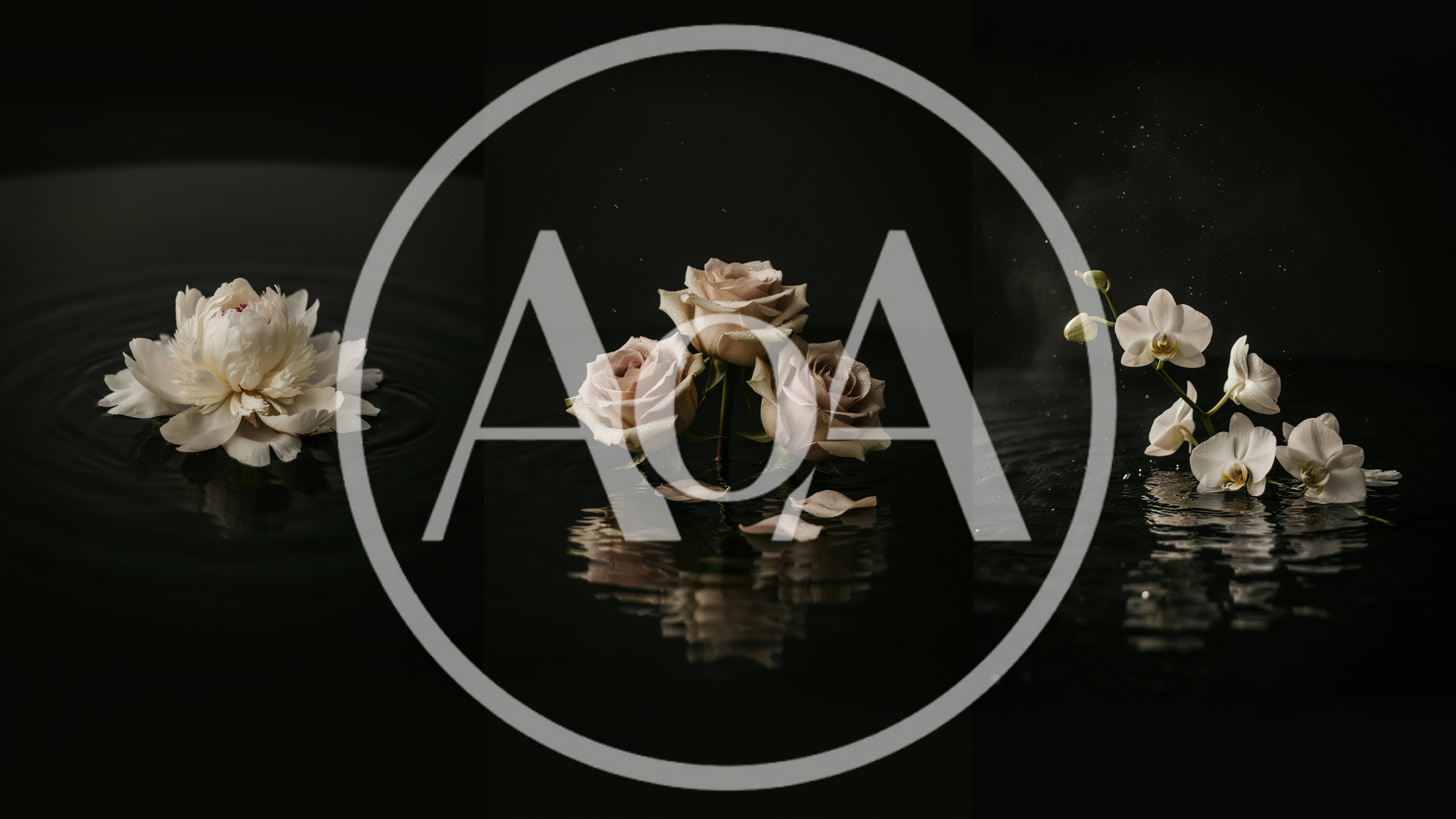 Three Floral Compositions Floating On Dark Water