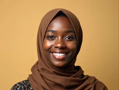 Portrait Of A Smiling Young Woman Wearing A Hijab