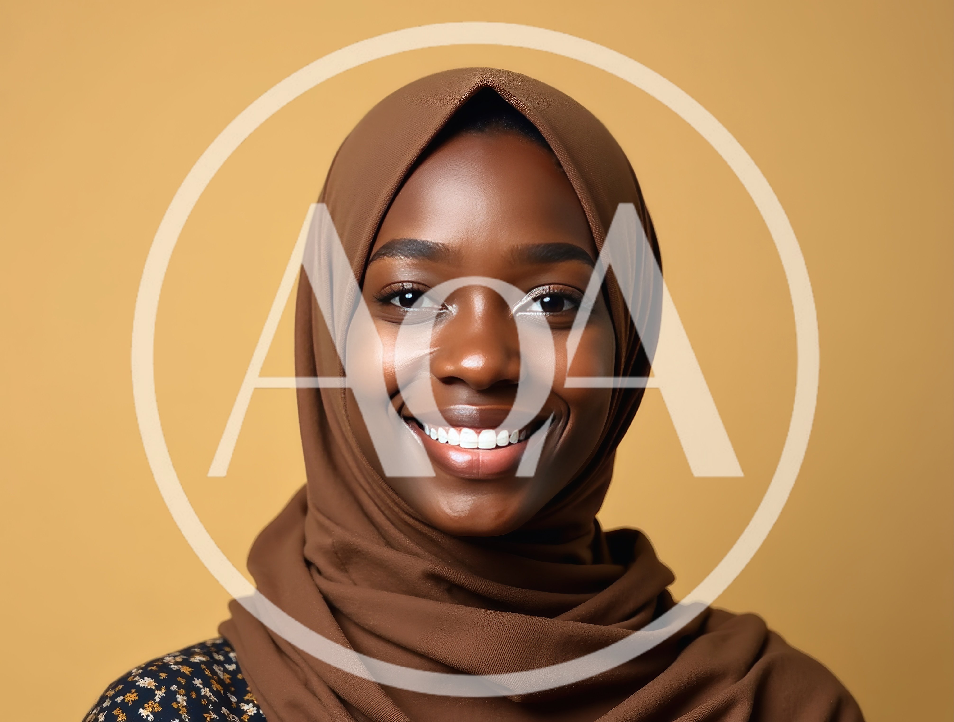 Portrait Of A Smiling Young Woman Wearing A Hijab