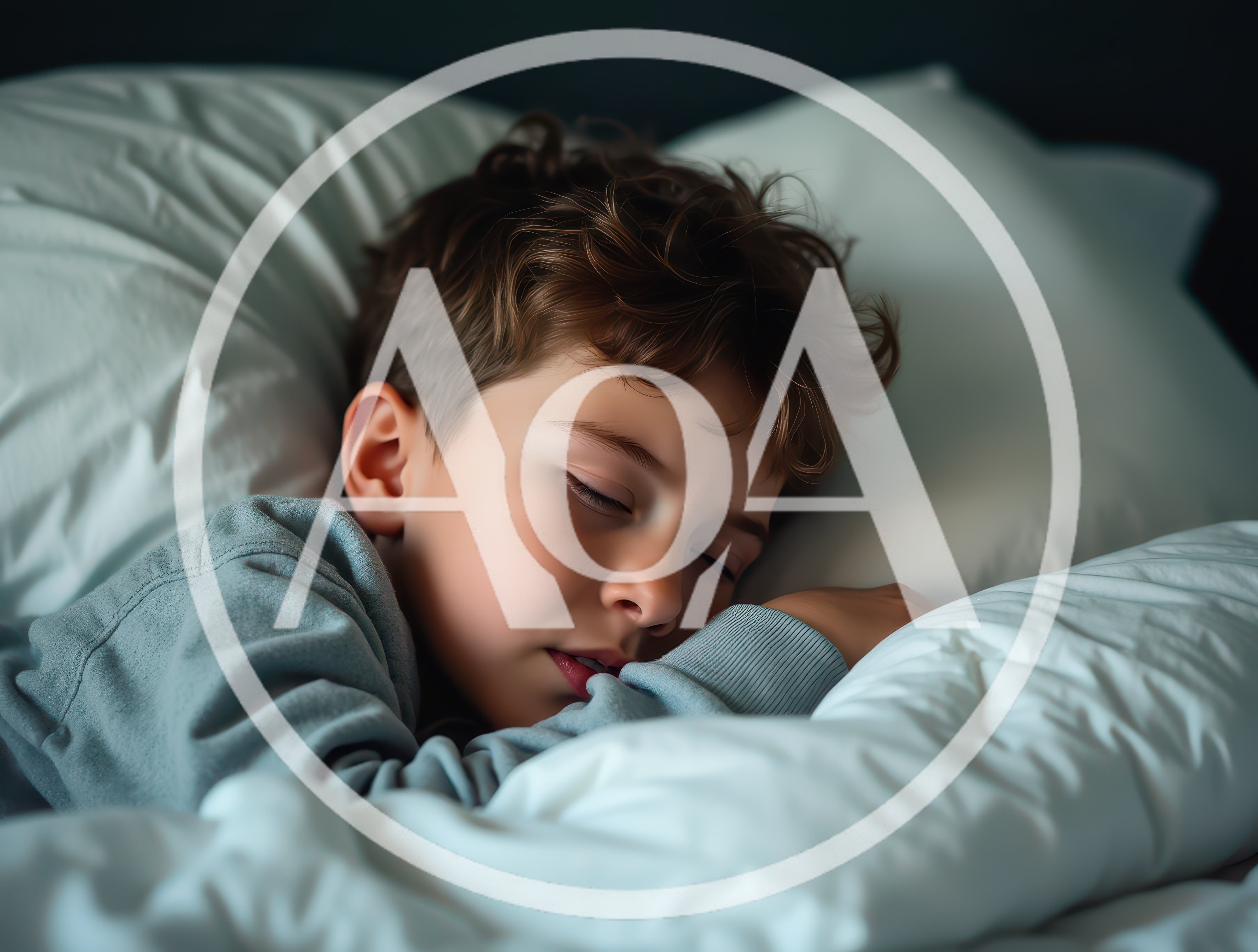 Young Boy Sleeping Peacefully In Bed