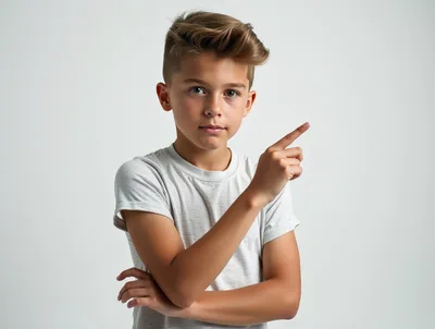 Young Boy Pointing To The Side