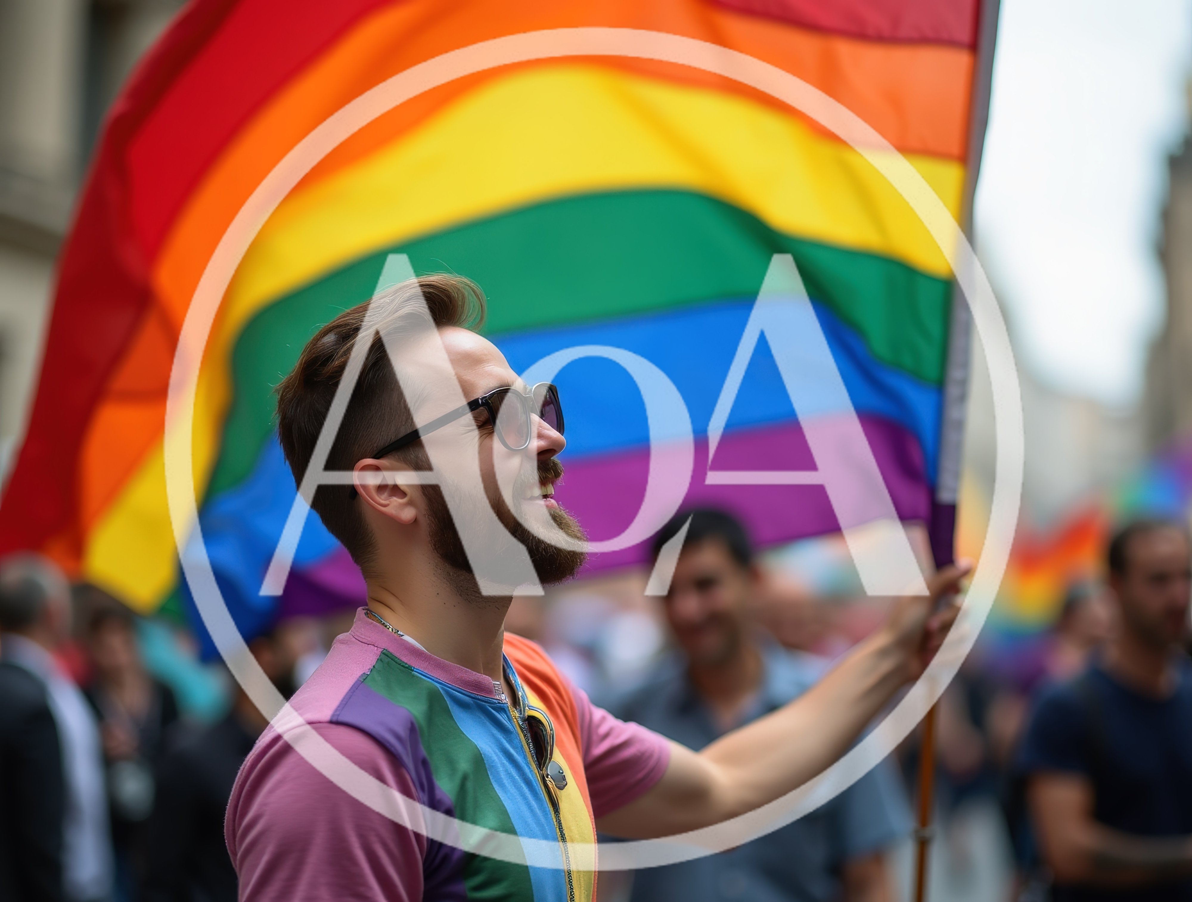 Young Man Holding Pride Flag At Parade