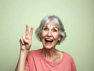 Senior Woman Making A Peace Sign Gesture