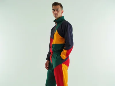 Young Man Posing In A Colorful Retro Tracksuit
