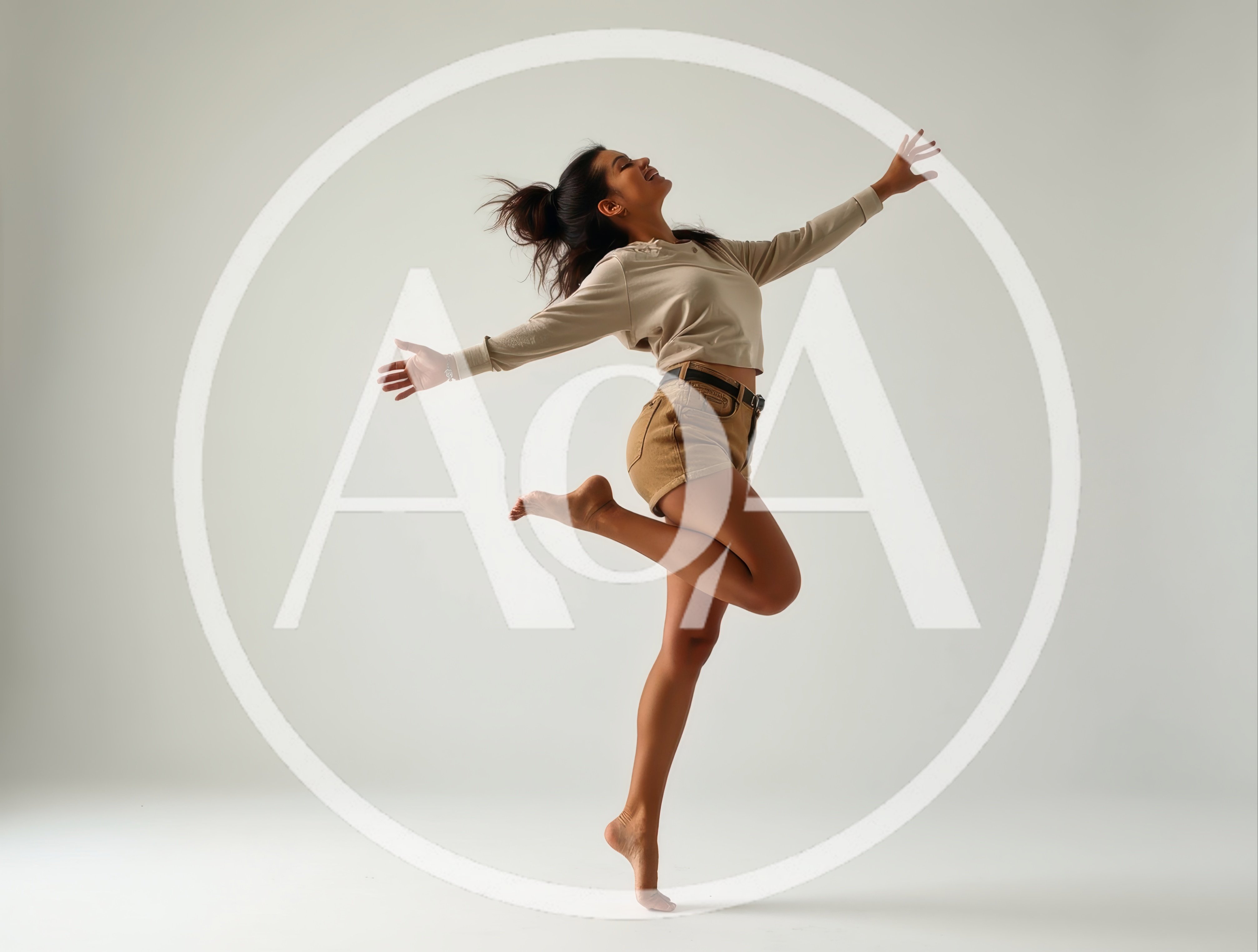 Young Woman Jumping With Joy In Studio