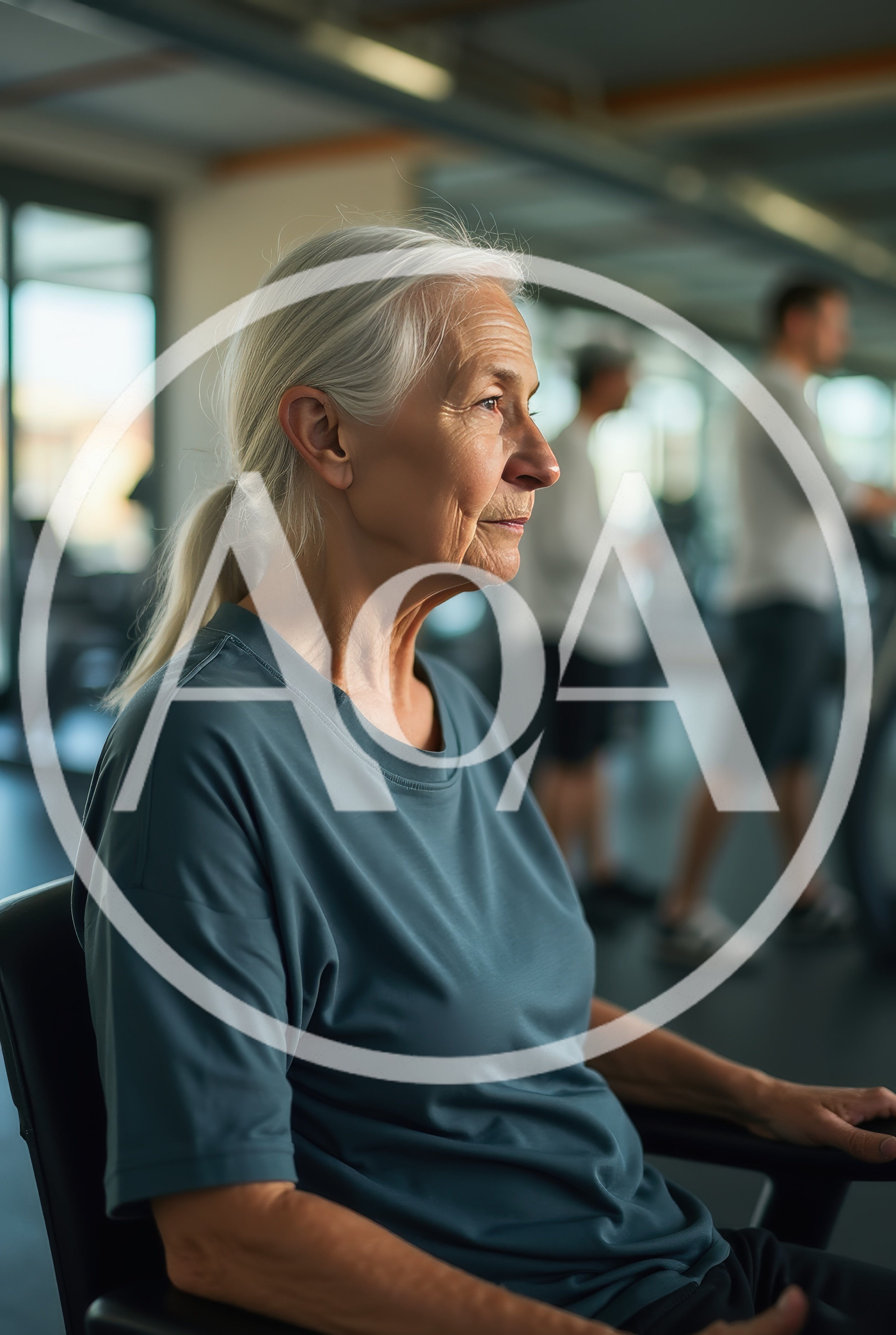 Senior Woman Resting In A Modern Fitness Center