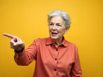 Senior Woman Pointing To The Side