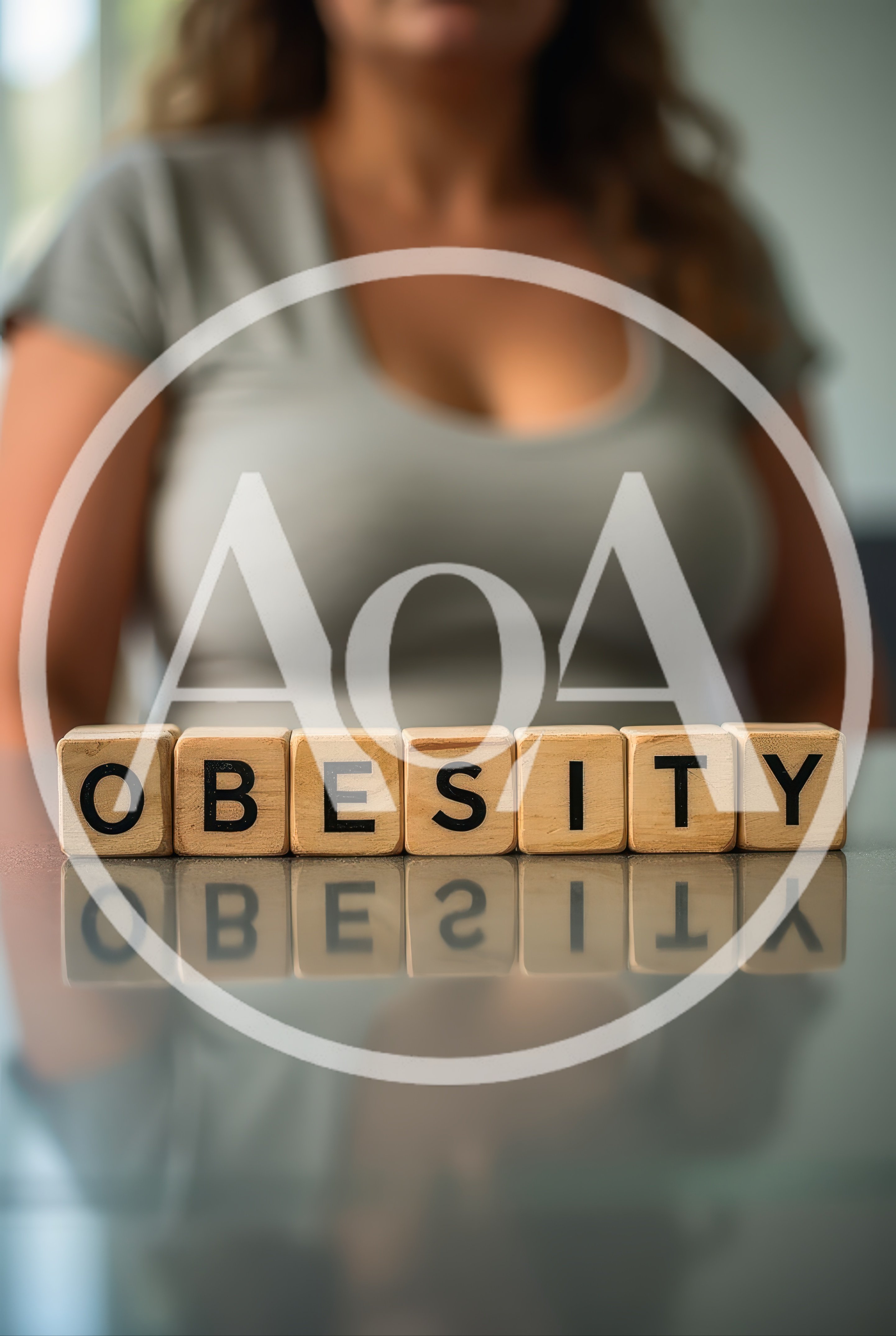 Wooden Blocks Spelling Obesity With Blurred Woman In Background