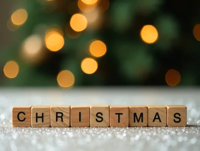 Wooden Blocks Spelling Christmas On Glittery Surface