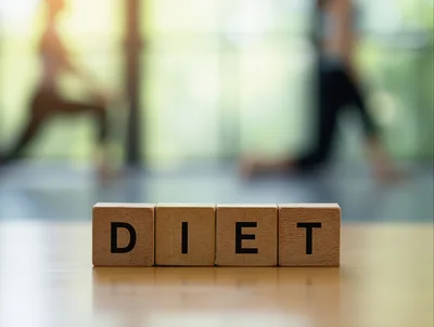 Wooden Blocks Spelling Diet on a Gym Table