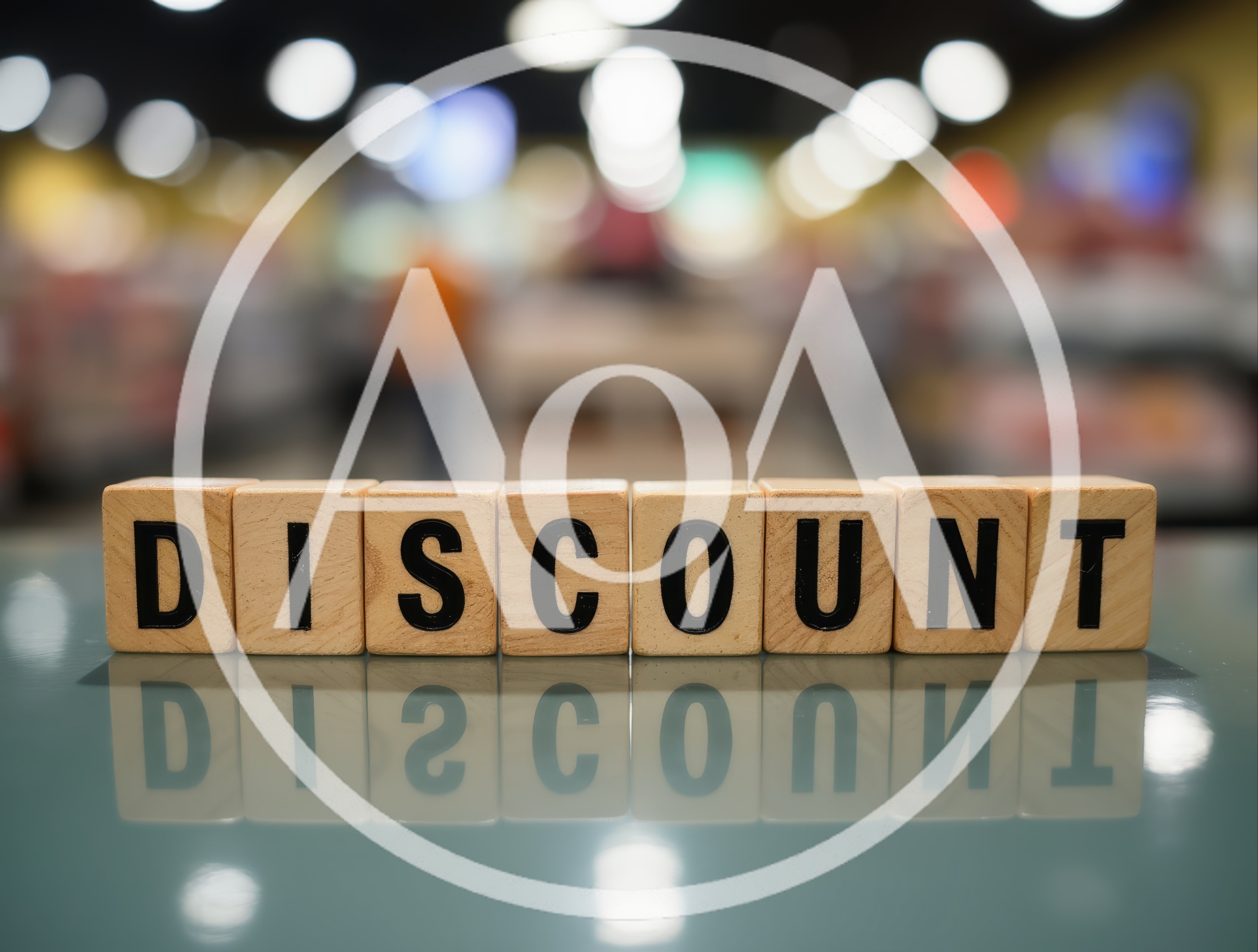 Wooden Blocks Spelling Discount on Reflective Surface