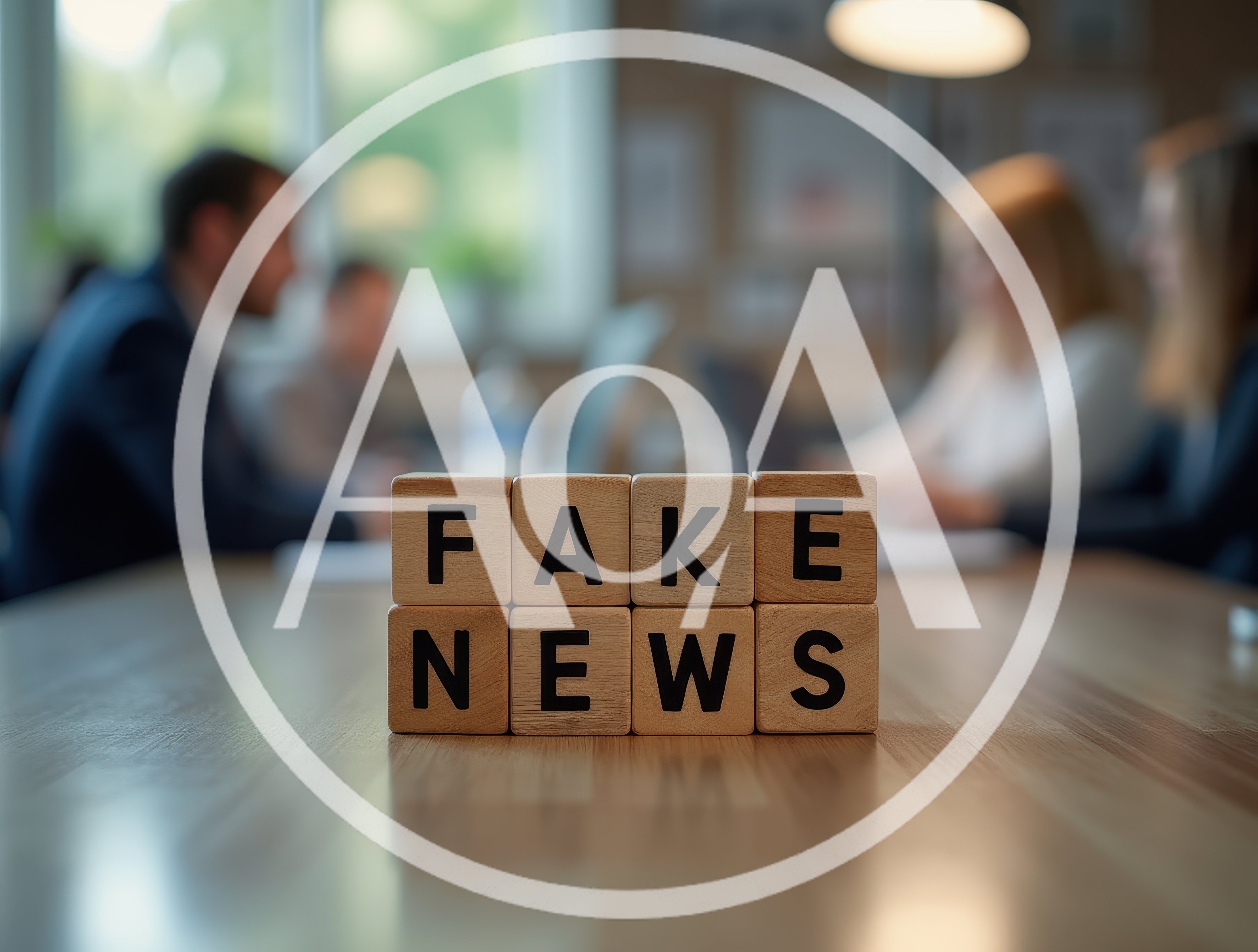 Wooden Blocks Spelling Fake News On Office Table