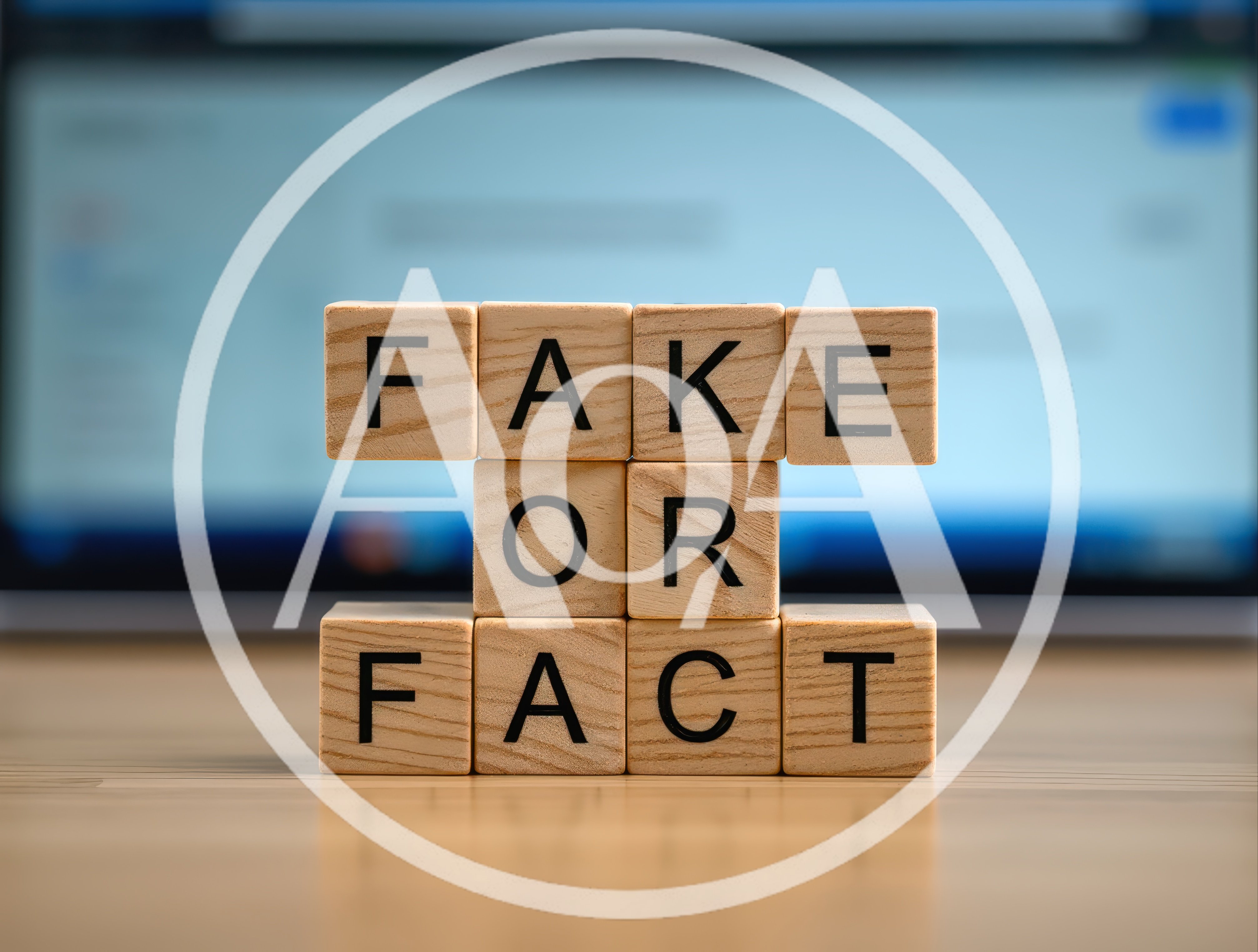 Wooden Blocks Spelling Fake Or Fact On Desk