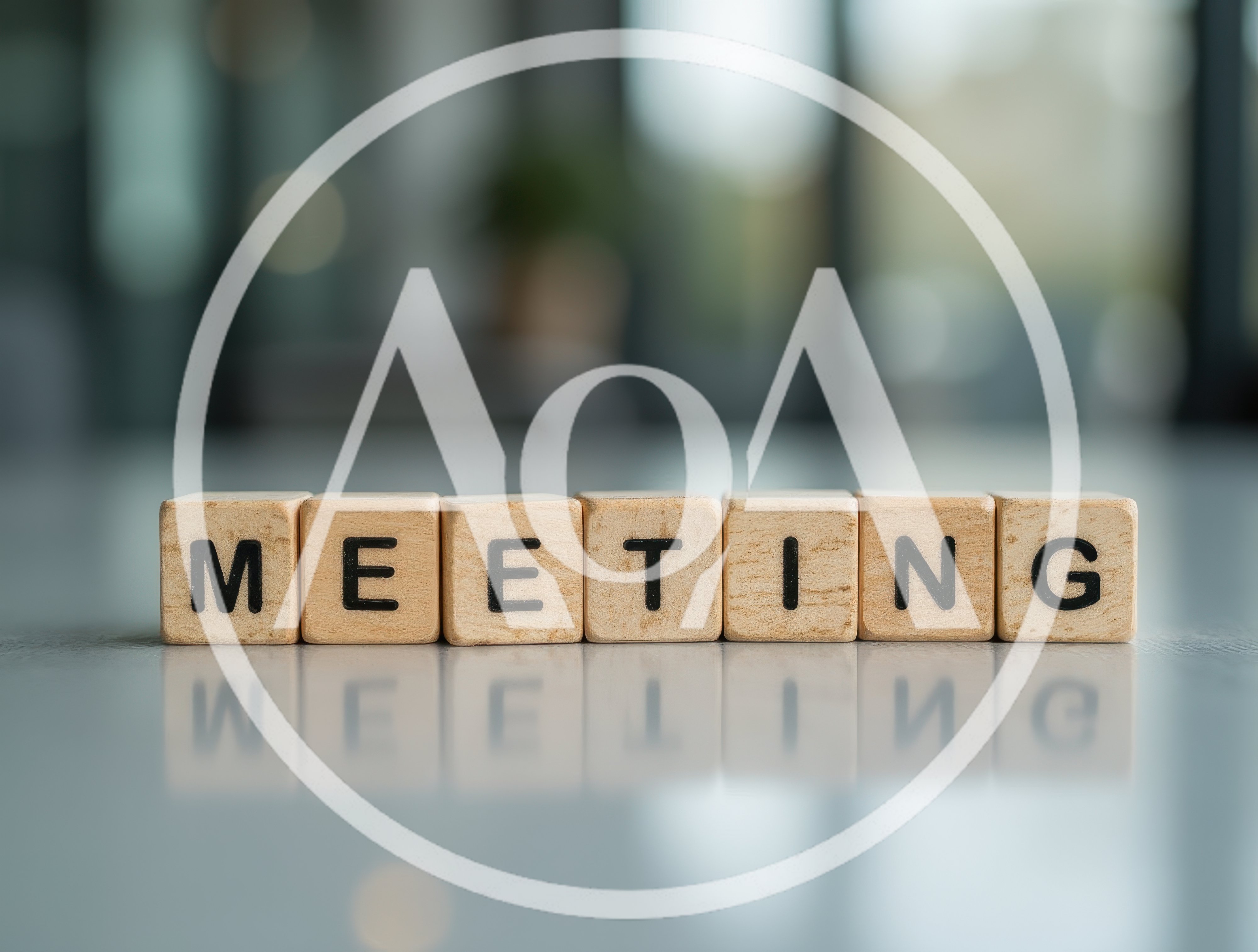 Wooden Blocks Spelling Meeting On A Reflective Surface