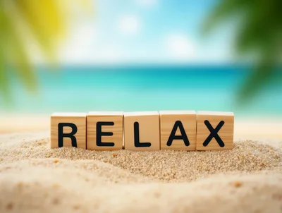 Wooden Blocks Spelling Relax On Sandy Beach