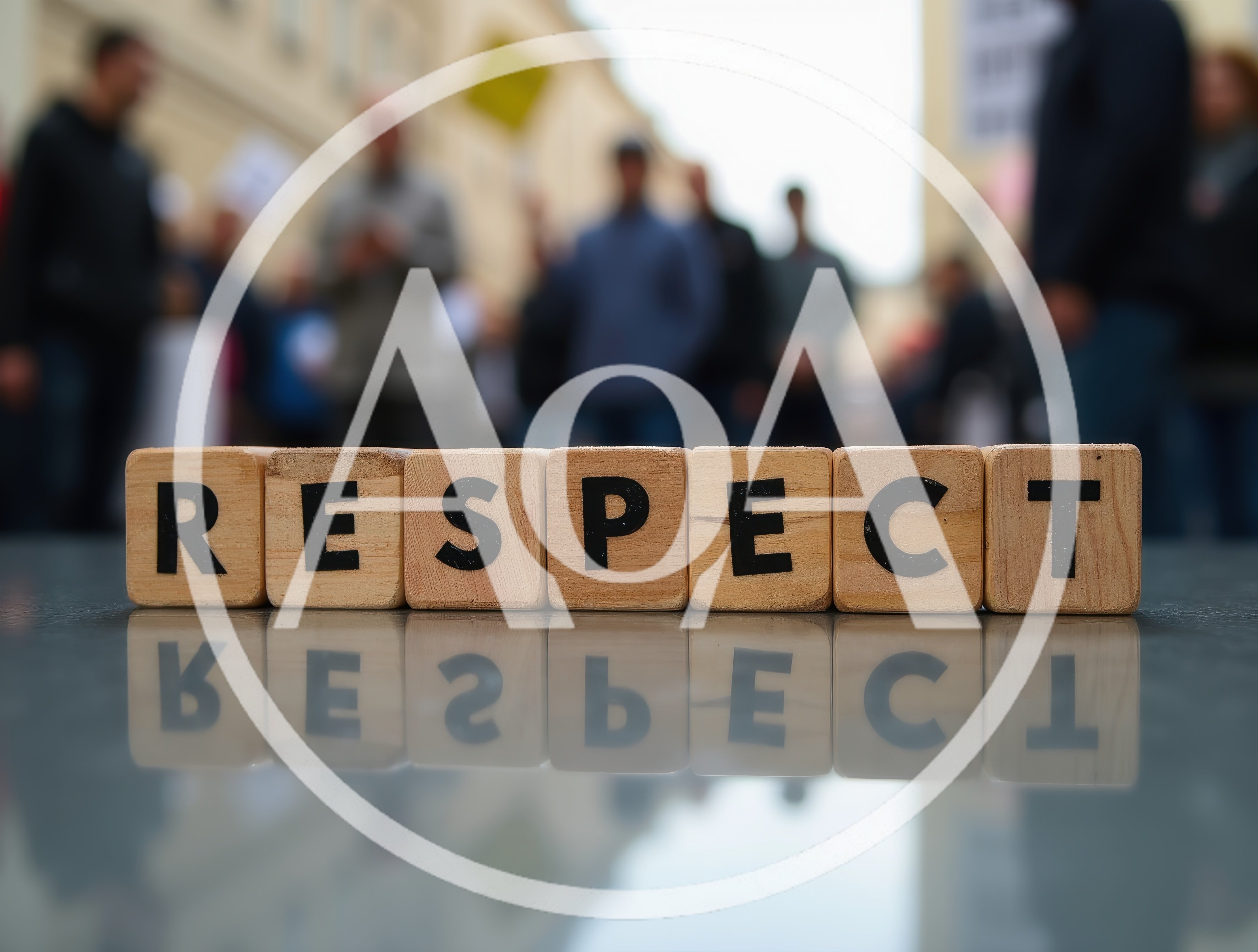 Wooden Blocks Spelling Respect With Blurred Crowd Background
