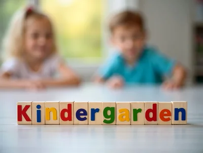 Wooden Blocks Spelling Kindergarten With Blurred Children In Background