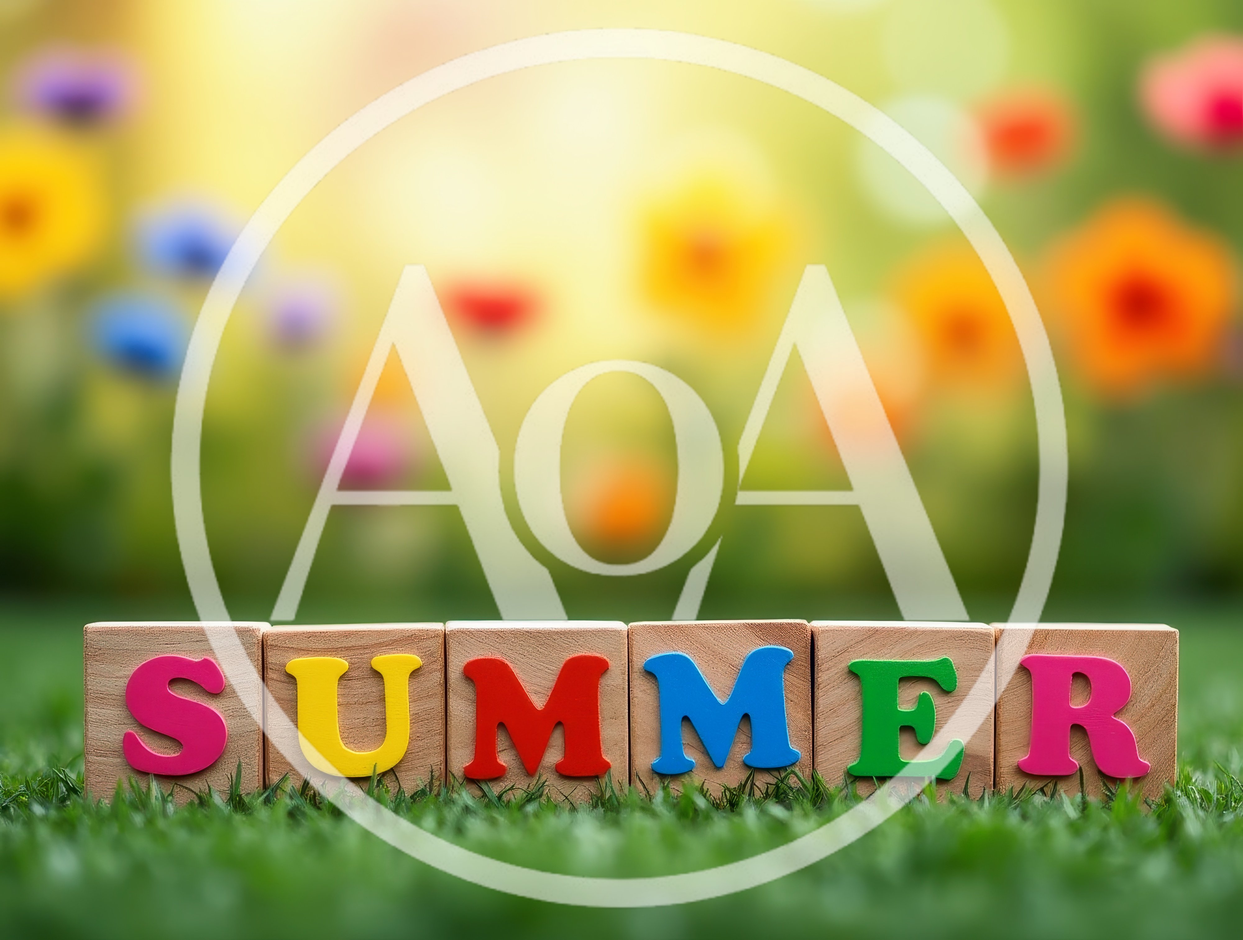 Colorful Summer Wooden Blocks on Green Grass
