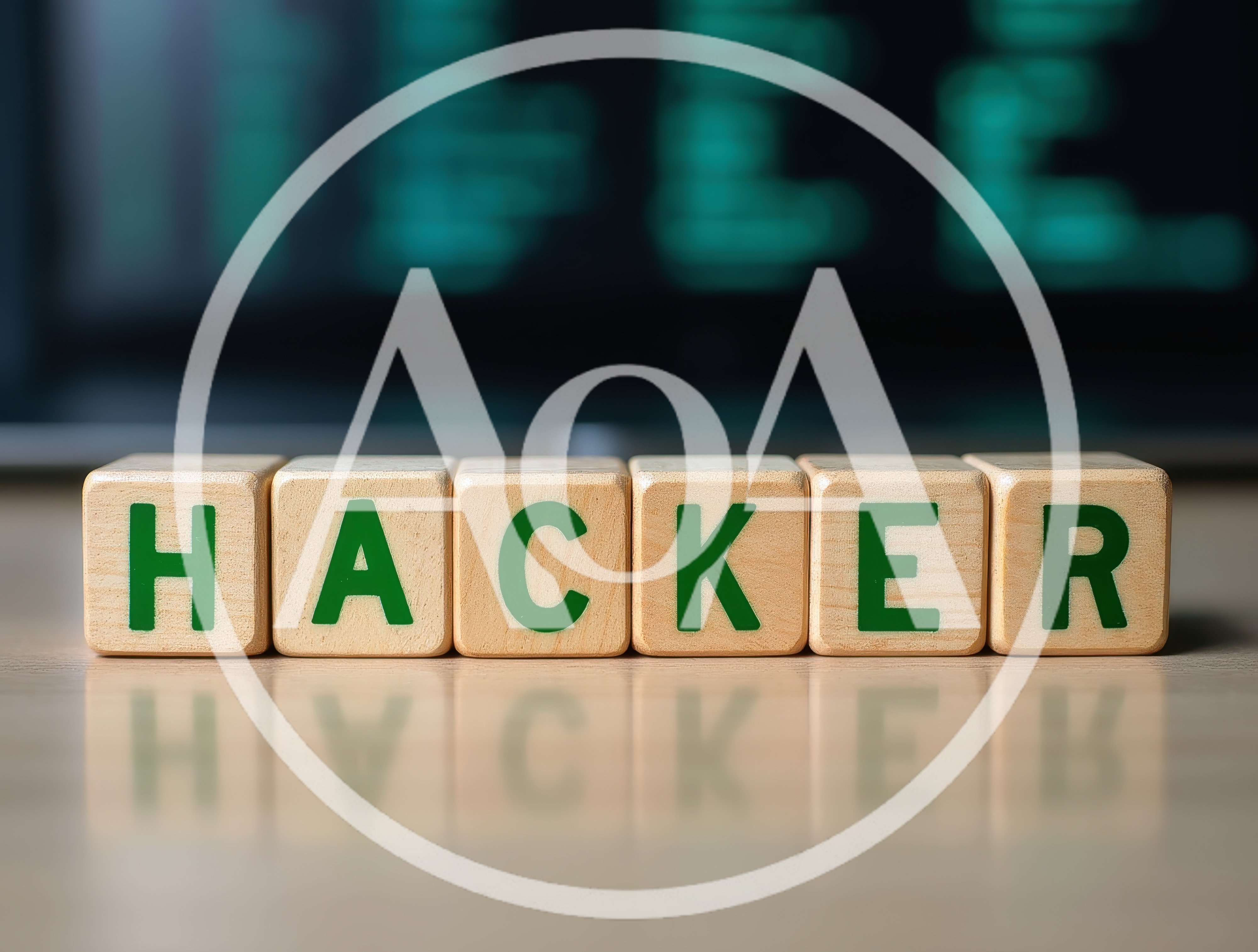 Wooden Blocks Spelling Hacker With Blurred Computer Code Background
